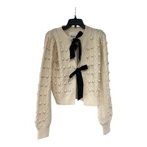 Chic Cream Cardigan with Black Ribbon Accents